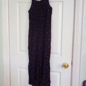 Young Girls Sleeveless jumpsuit with adjustable straps. By Art Class .